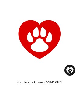 Pet paw love logo. Animal footprint with heart silhouette around.