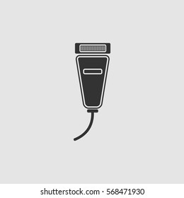Pet shaving machine icon flat. Black pictogram on grey background. Vector illustration symbol