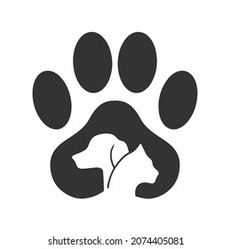 Pet Shop Logo Design with Dog and Cat in the Middle of Dog Paws. Animal Stencil Flat Vector Illustration on White Background.