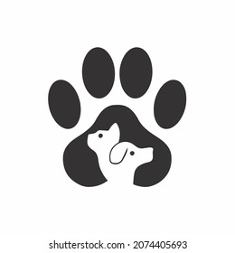 Pet Shop Logo Design with Dog and Cat in the Middle of Dog Paws. Animal Stencil Flat Vector Illustration on White Background.