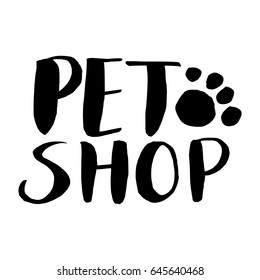 Pet shop logo, label with paw. Brush calligraphy, hand lettering.