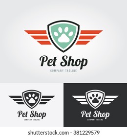 Pet shop logo template. Animal paw print Icon with shield and wings.