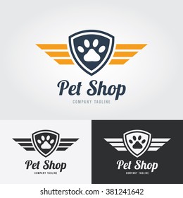 Pet shop logo template. Animal paw print Icon with shield and wings. Vector for pet shop, hotel, vet clinic.