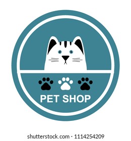 Pet shop logo. White with black cat face and paw print. Animal care emblem. Flat vector illustration with text pet shop. Round icon. Blue background