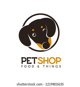 Pet shop vector logo concept. Isolated logotype of funny puppy Dachshund in a circle. Head of Hunting dog s in flat style on white background