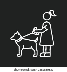 Pet sitting chalk white icon on black background. Woman with dog on leash. Pet owner. Obedient domestic animal. Trainer service. Girl walk outdoor. Isolated vector chalkboard illustration