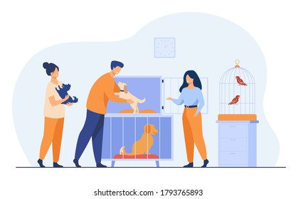 Pet Store Or Animal Shelter Concept. Man Taking Puppy From Cage, Buying Or Adopting Dog. Volunteers Helping To Choose Homeless Animal For Adoption