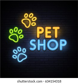 The pet store. Neon bright sign. Logo. Bright banner. Paws. Emblem. The goods for animals. Vector image