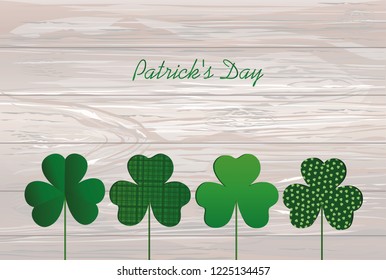 Petals of clover with the image on sticks. pozdavitelnaya card for St. Patrick's Day with a blank space for text or advertising. Vector illustration on a wooden background.