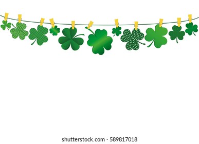 Petals of clover with a picture hanging on a rope with clothespins. Patrick 's Day. Vector illustration. Greeting card with empty space for text or advertising. On a green background