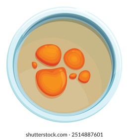 Petri dish containing orange bacteria growing in it, a common sight in laboratories