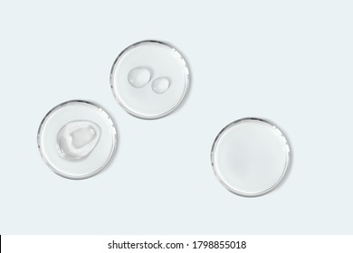Petri dishes with cosmetic smudge and drops isolated realistic vector illustration. Concept laboratory tests and research. Transparent chemistry glassware on light blue background