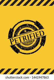 Petrified black grunge emblem inside yellow warning sign. Vector Illustration. Detailed.