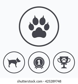 Pets icons. Cat paw with clutches sign. Winner cup and medal symbol. Dog silhouette. Icons in circles.