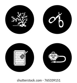 Pets supplies glyph icons set. Aquarium plant, pet nail clippers, cat's litter box, vacuum cleaner. Vector white silhouettes illustrations in black circles