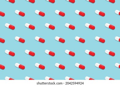 Pharmaceutical medicine pills. Capsule pattern isolated on blue background. Medicine creative concept. Vector illustration