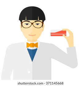 Pharmacist showing some medecine. Pharmacist showing some medecine.