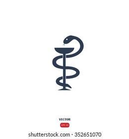 Pharmacy with caduceus, bowl with a snake.