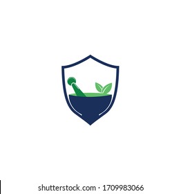 Logotipo del concepto de la forma del escudo médico de la farmacia. Logo de mortero y almirez natural.