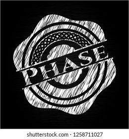 Phase written on a chalkboard