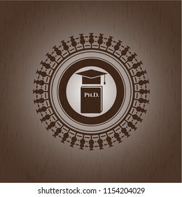 Phd thesis icon inside vintage wood emblem