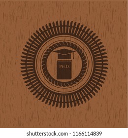 Phd thesis icon inside wood emblem