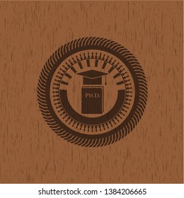 Phd thesis icon inside wooden emblem