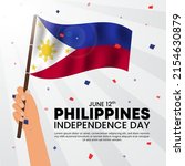Philippines independence day background with a hand holding a flag