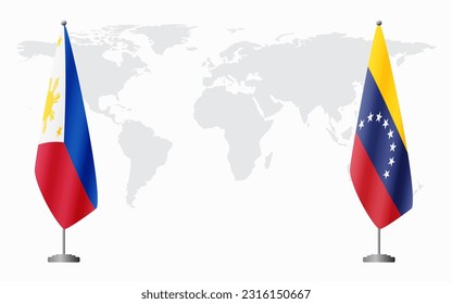 Philippines and Venezuela flags for official meeting against background of world map.