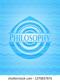 Philosophy light blue water wave badge.