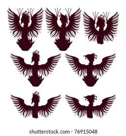 Phoenix or firebird silhouettes rising from fire and standing alone