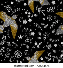 phoenix, firebird.  white lace. Traditional stylish fashionable embroidered embroidery on a black background. sketch for printing on fabric, bag, clothes, accessories and design. trend vector