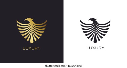 Phoenix Gold shield logo stylized golden flying bird