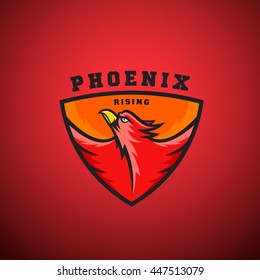 Phoenix Rising Abstract Vector Logo Template. Flying Fire Bird Illustration in a Shield. Perfect for Sport Team Emblems, League Labels, etc. On Red Background.