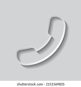 Teléfono, llama a un icono simple. Diseño plano. Estilo de papel con sombra. Fondo gris.ai