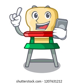 With phone character baby eat on highchair indoors