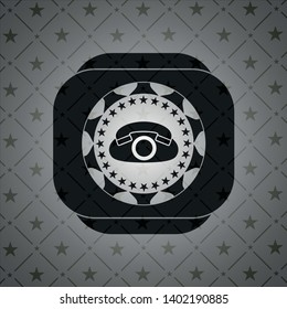 phone icon inside black emblem