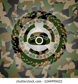phone icon inside camouflaged emblem