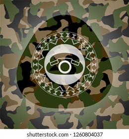 phone icon inside camouflaged emblem