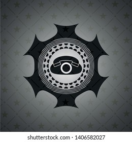 phone icon inside dark badge or emblem