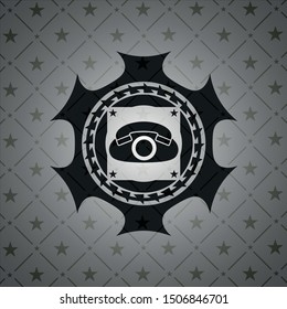 phone icon inside dark badge or emblem
