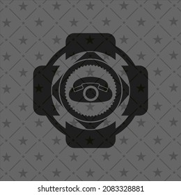 Telefonsymbol in dunklem Emblem. 
