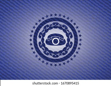 phone icon inside emblem with denim high quality background