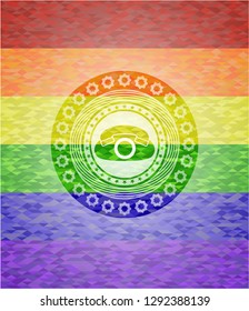 phone icon inside emblem on mosaic background with the colors of the LGBT flag