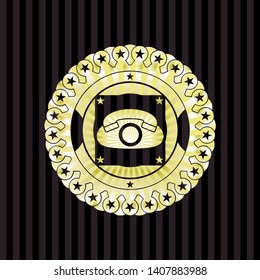phone icon inside gold emblem or badge