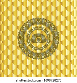 icono del teléfono dentro de una insignia dorada brillante. Patrón de escalas. Ilustración vectorial. Detallado.