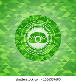 phone icon inside green emblem with mosaic ecological style background