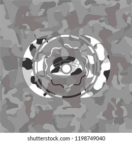 phone icon inside grey camouflaged emblem