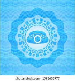 phone icon inside light blue water badge.