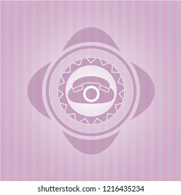 phone icon inside pink emblem